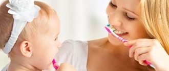 Mom and daughter brushing teeth